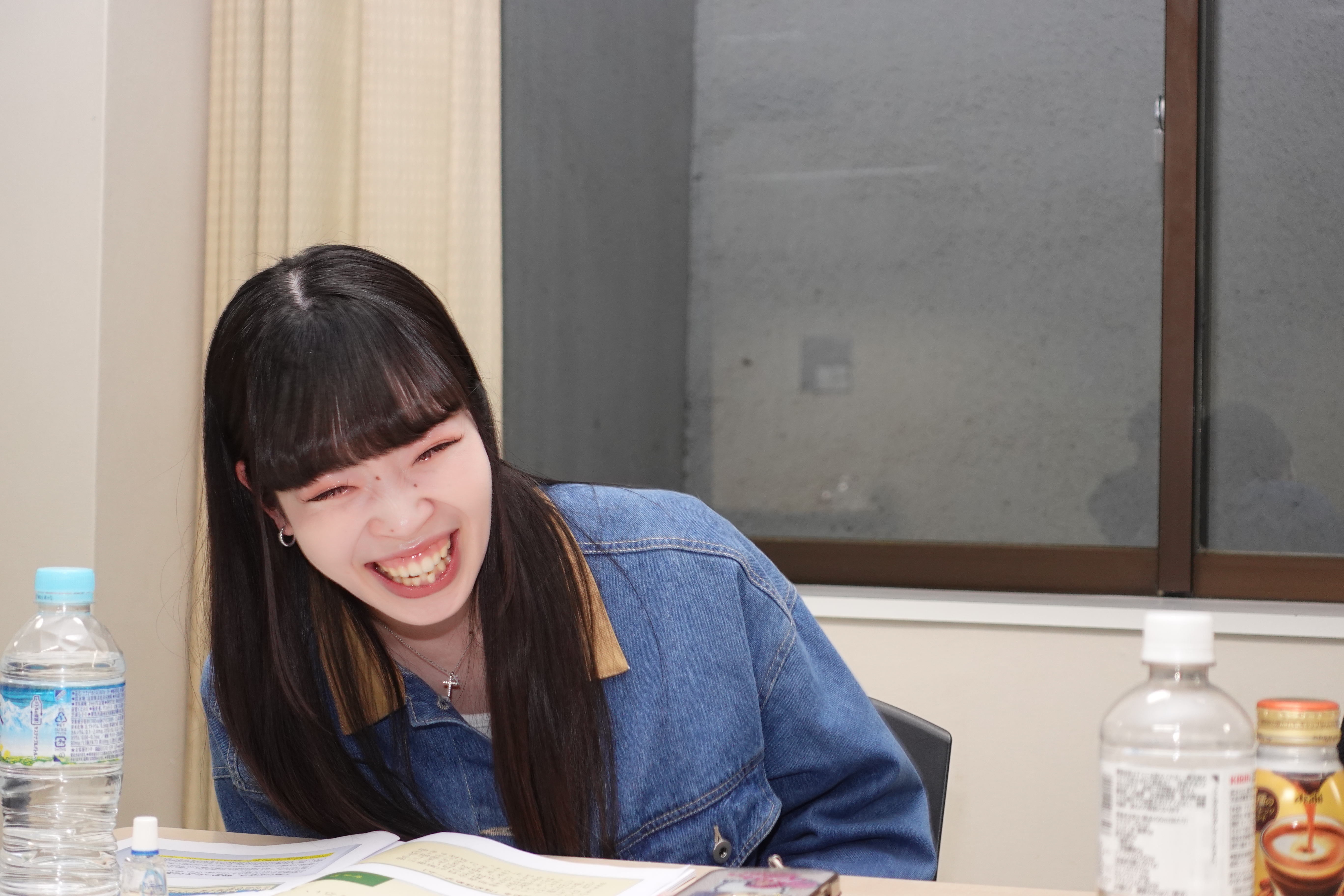 ドクターストレッチの店舗でお客様と向き合うトレーナー